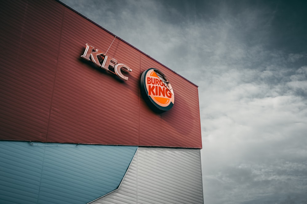 a burger king sign on the side of a building