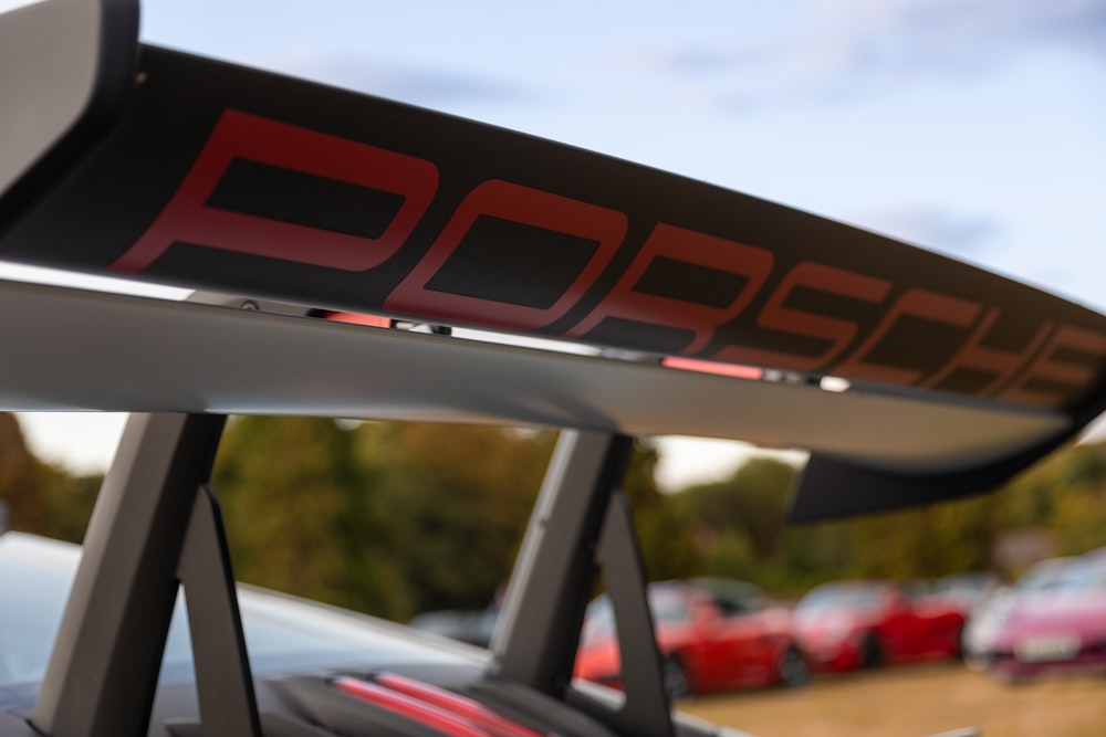 a pair of skis sitting on top of a car