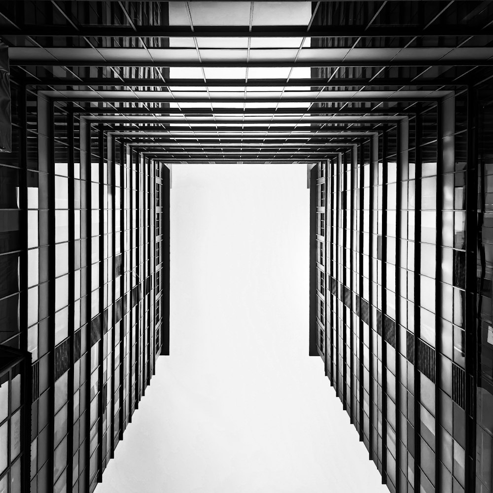 a black and white photo of a hallway