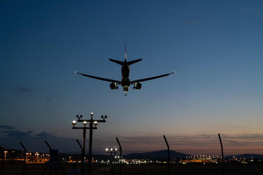 an airplane is taking off from an airport,