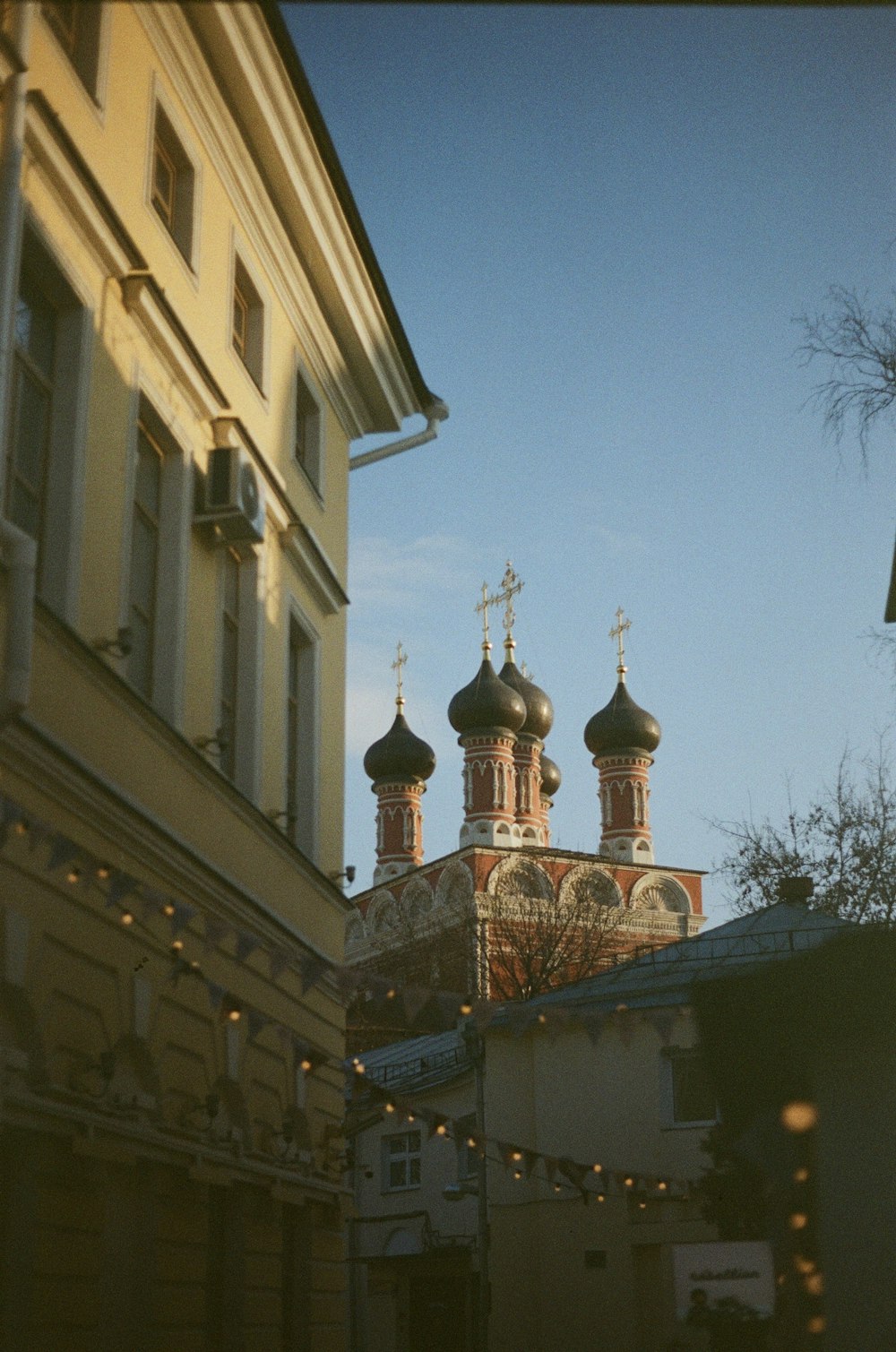 a building with two towers and a clock on it