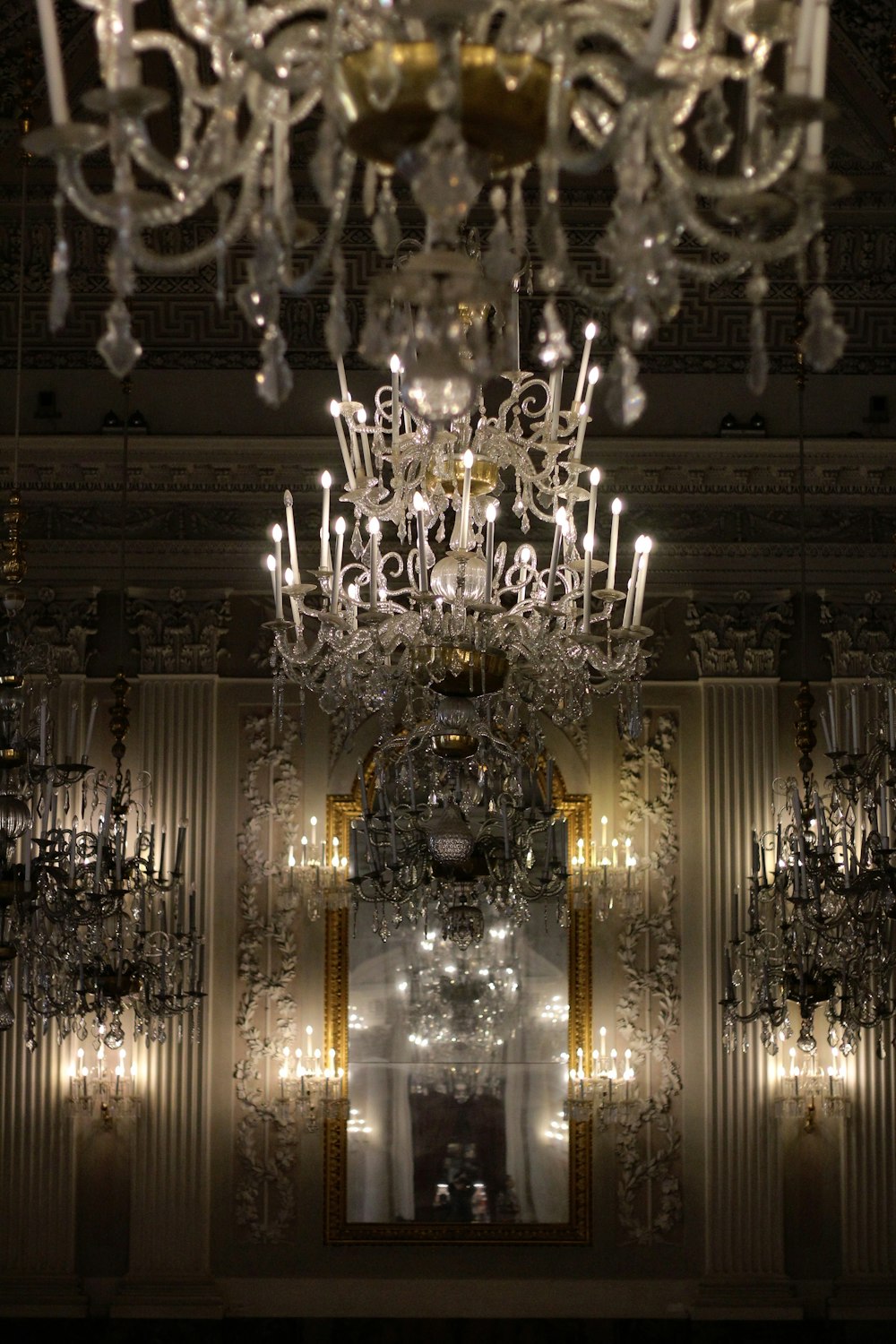 a chandelier hanging from the ceiling of a room