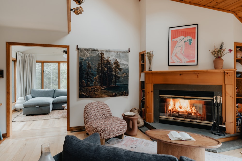 a living room filled with furniture and a fire place