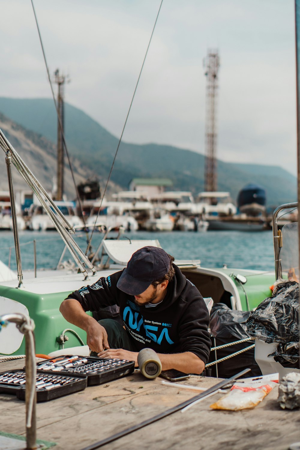 a man working on a keyboard on a boat