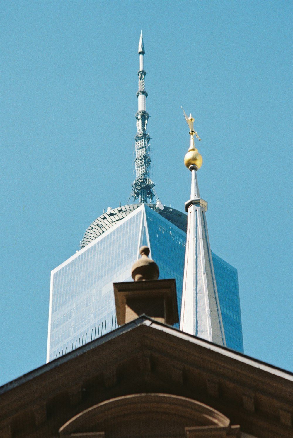 a tall building with a clock on the top of it