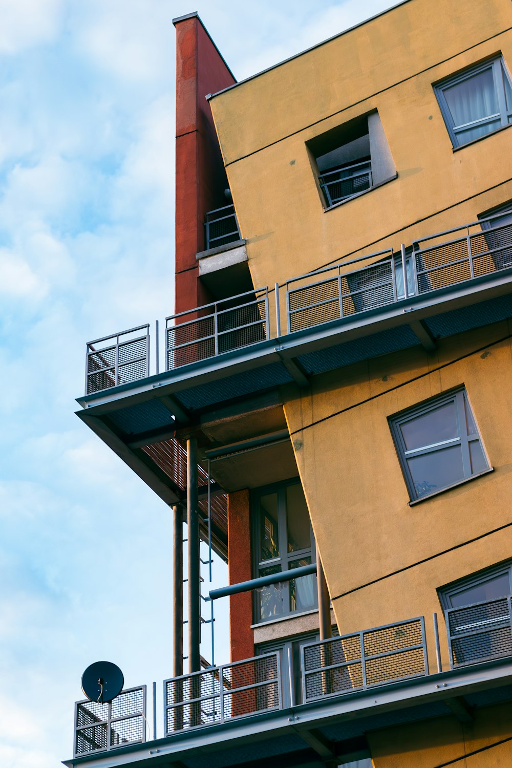 a tall building with balconies and balconies on it