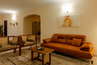 a living room with two couches and a coffee table