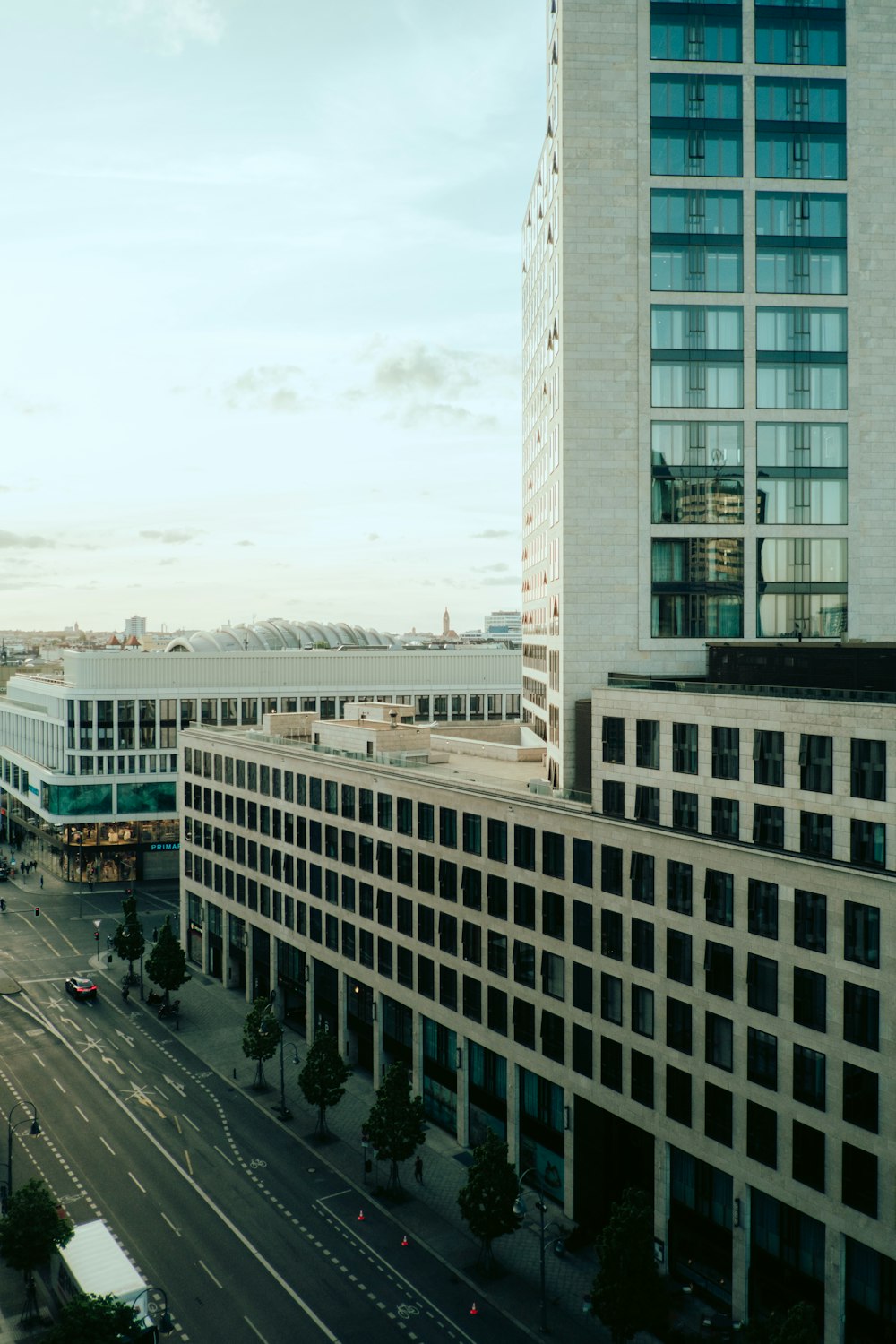 a view of a city street from a high rise building