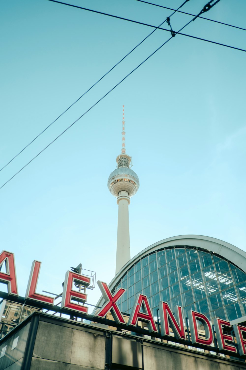 a tall building with a sign on top of it