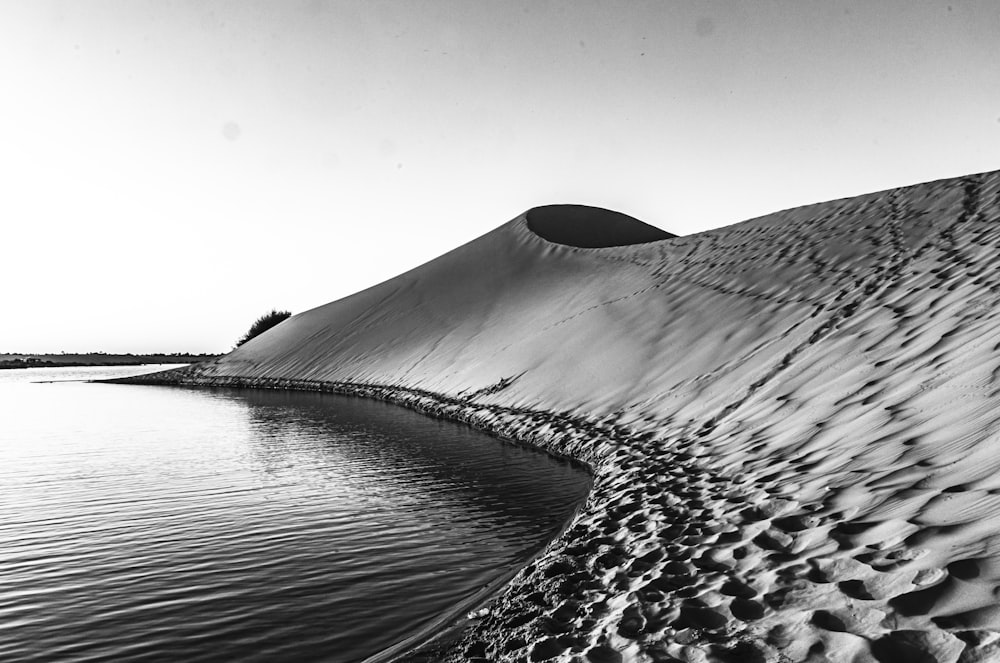 a black and white photo of a large body of water