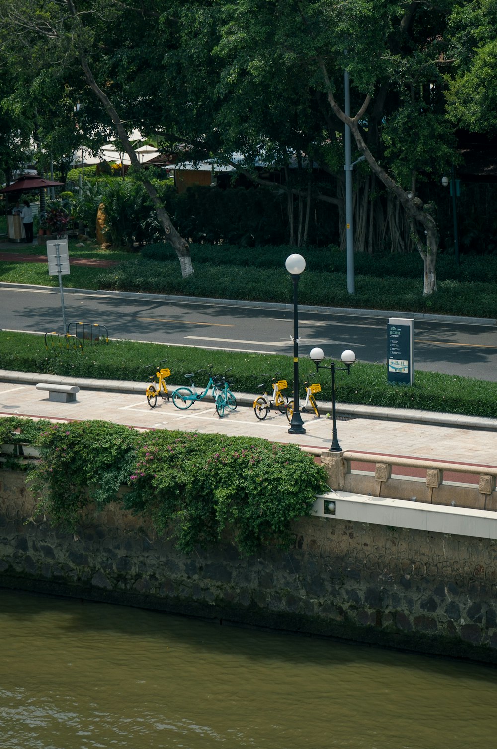 a couple of bikes parked on the side of a road