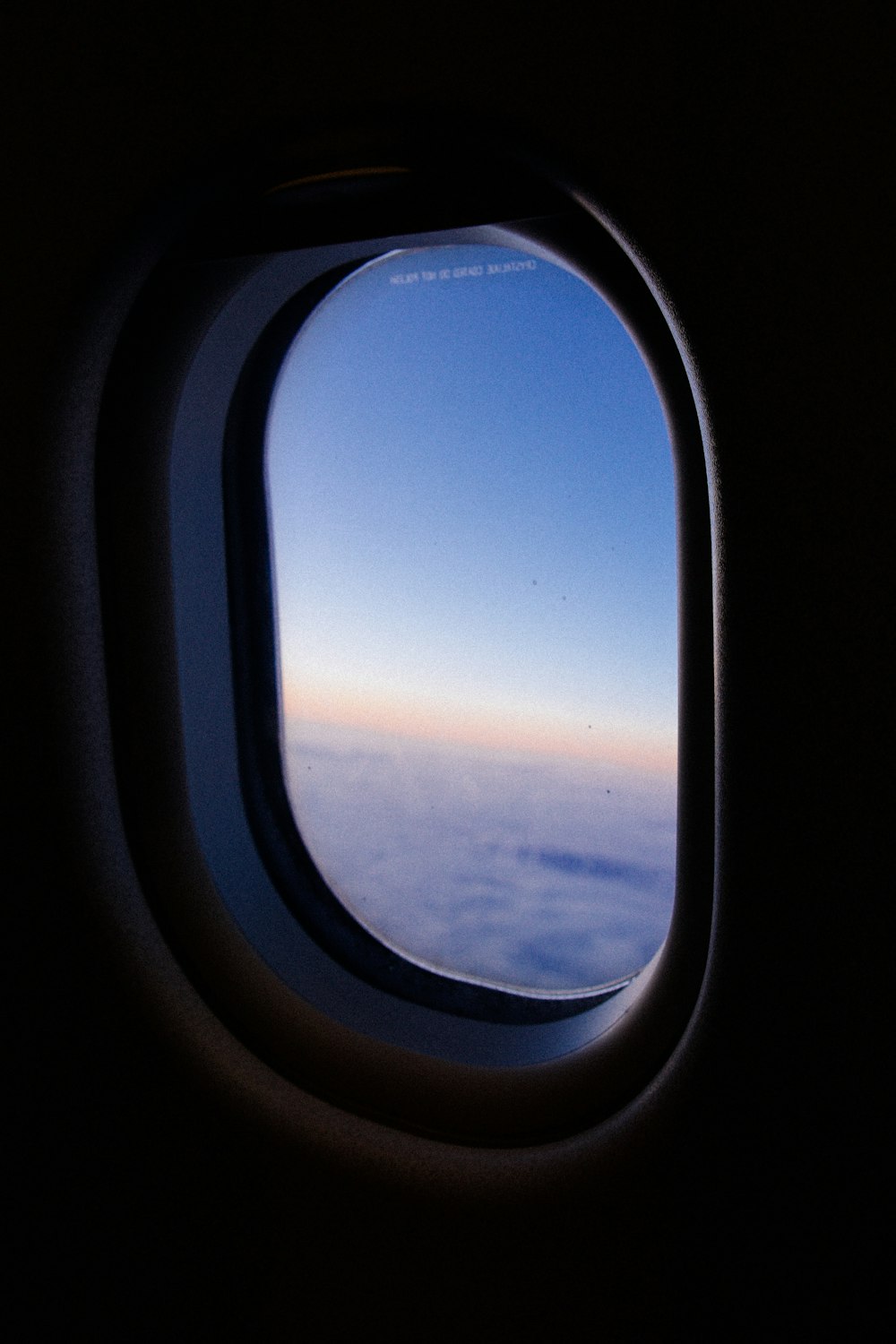 a view of the sky through an airplane window