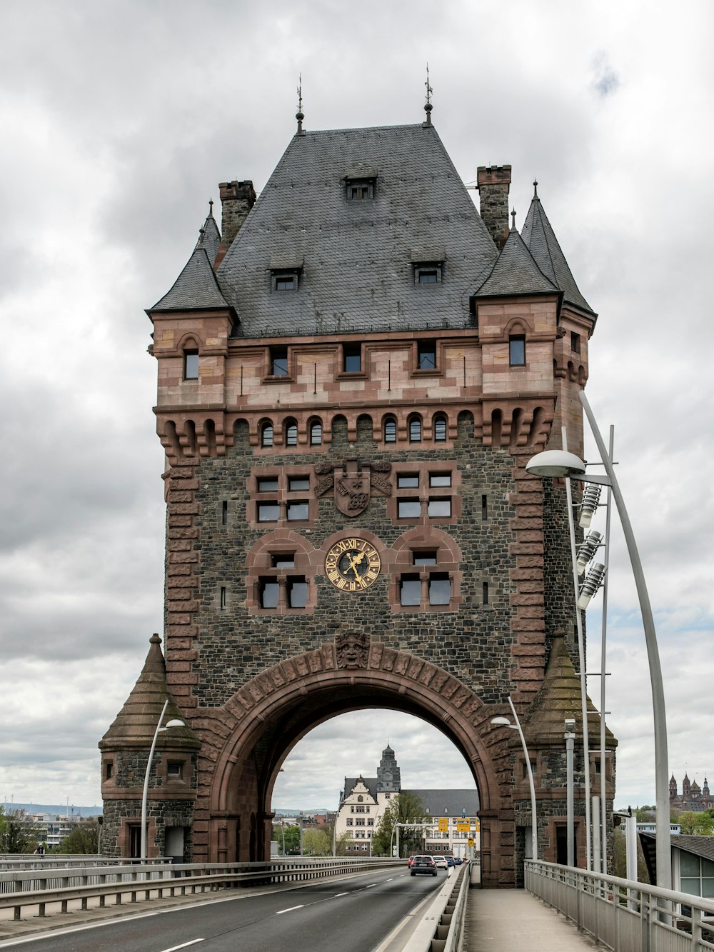 a very tall brick building with a clock on it's face