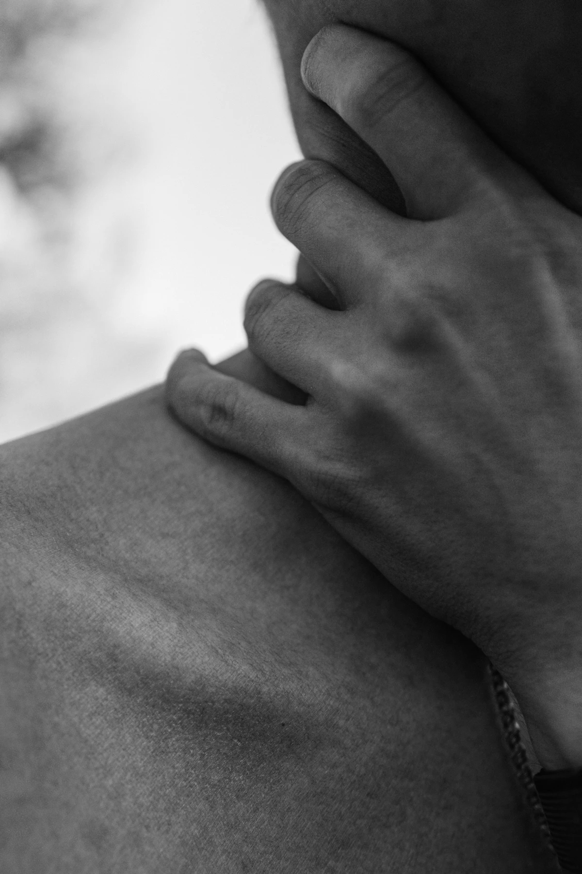 Man holding the back of his sore neck showing the classic whiplash injury pattern from a rear end car accident that CTP physiotherapy treats