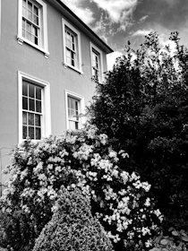 a black and white photo of a house