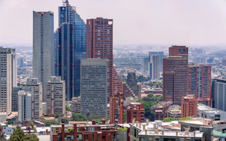 a view of a city with tall buildings