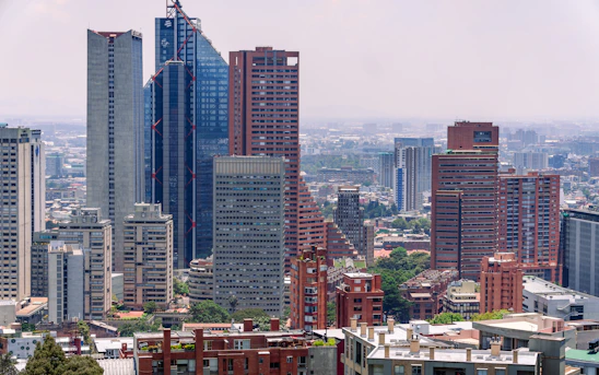 a view of a city with tall buildings
