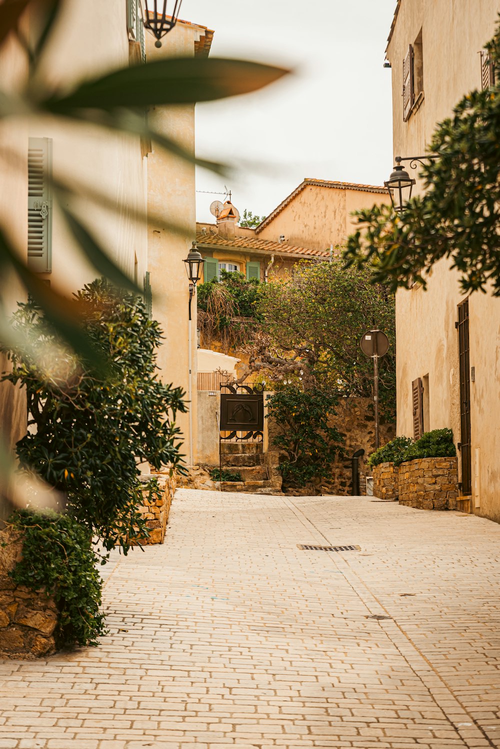 a street with a clock on the side of it