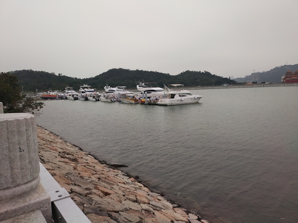 a bunch of boats that are sitting in the water