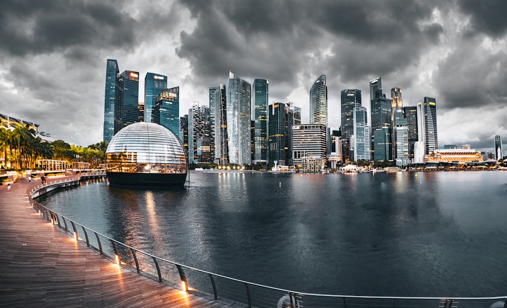 a large body of water with a city in the background