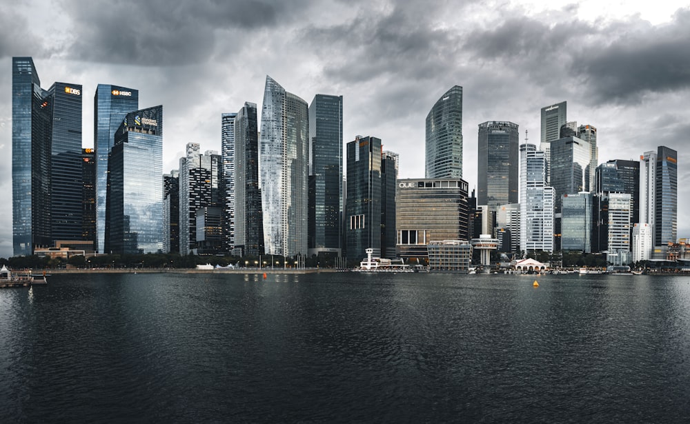 a large body of water surrounded by tall buildings