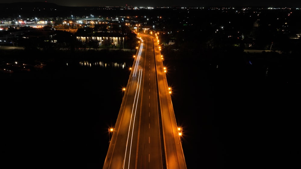 an aerial view of a highway at night