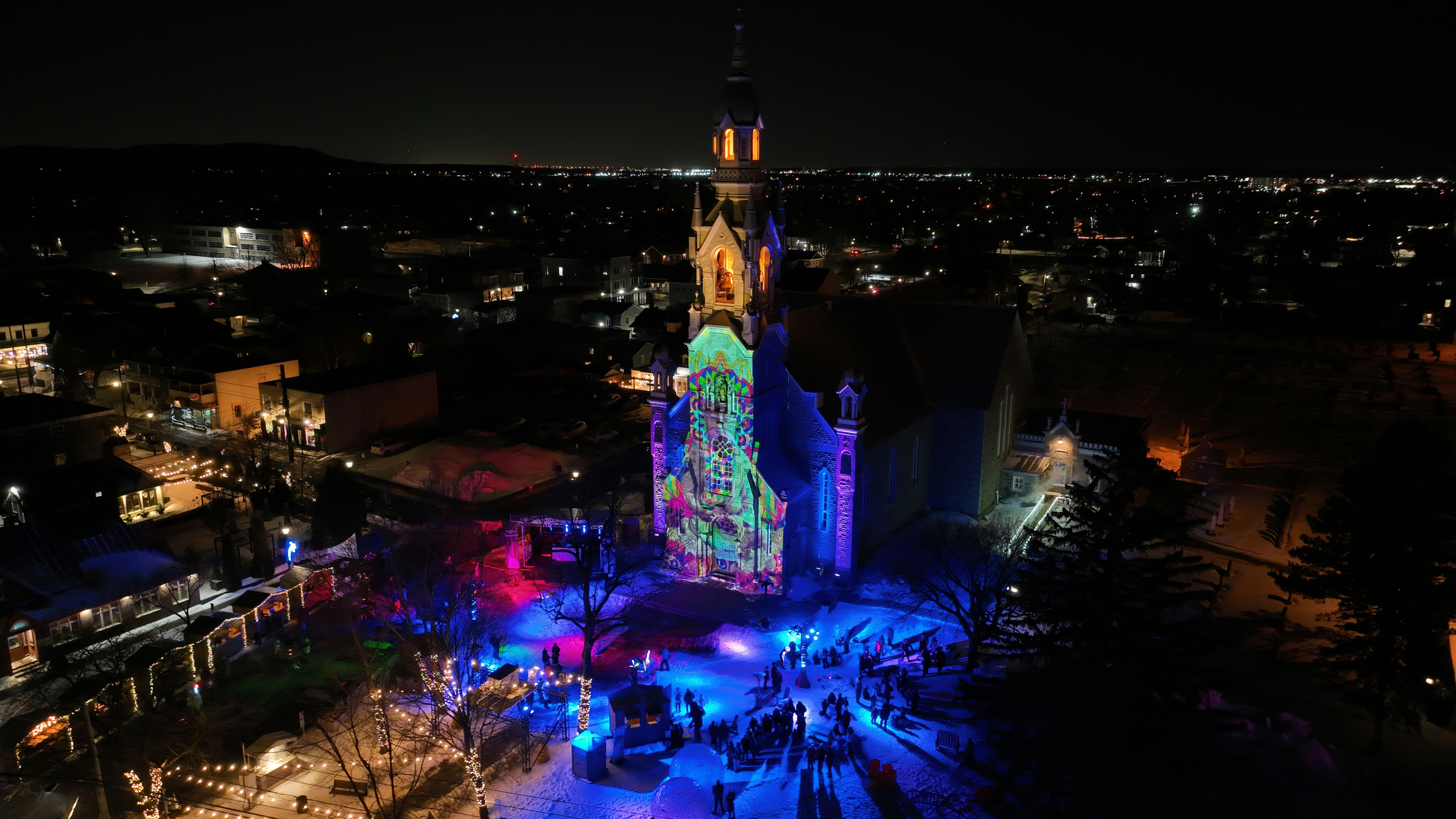 an aerial view of a city at night