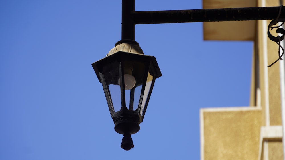 a street light hanging off the side of a building