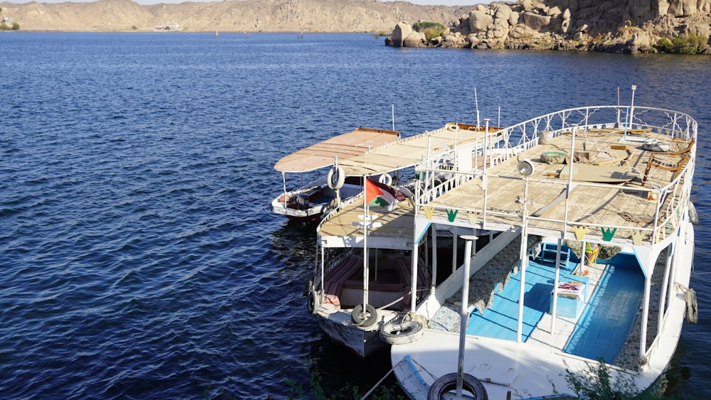 a large boat floating on top of a large body of water