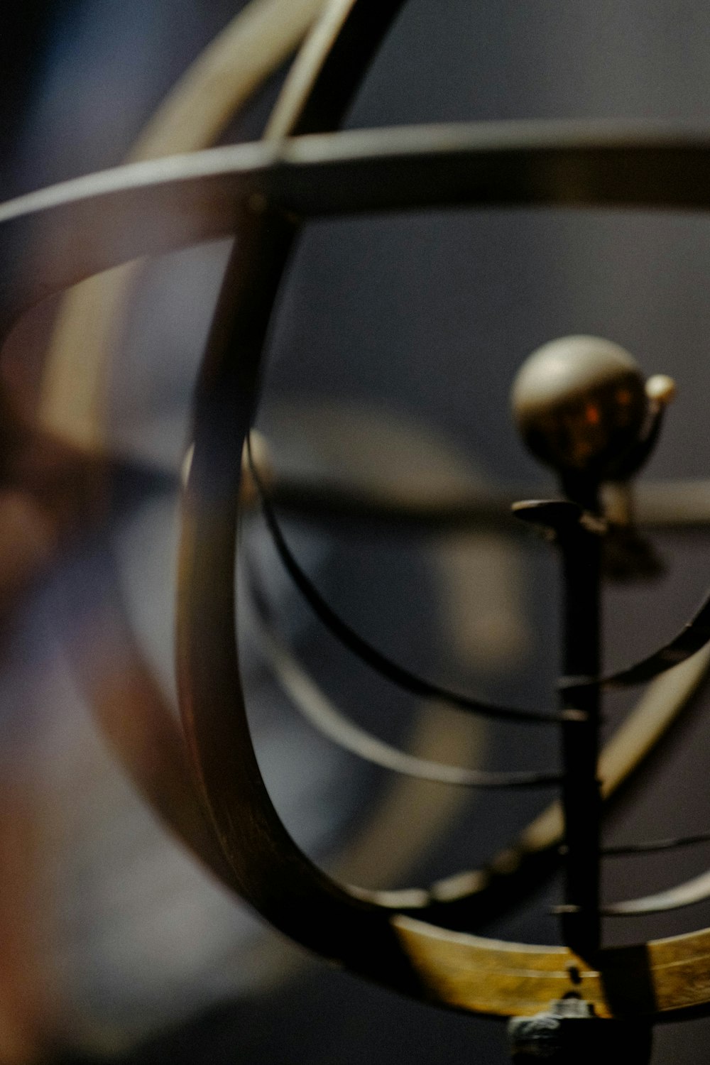 a close up of a metal object with a blurry background