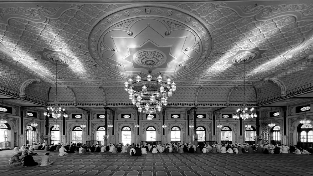 a large room with a chandelier and chandelier hanging from the ceiling