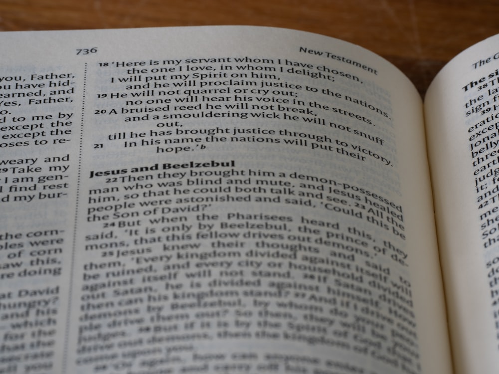 a close up of an open book on a table