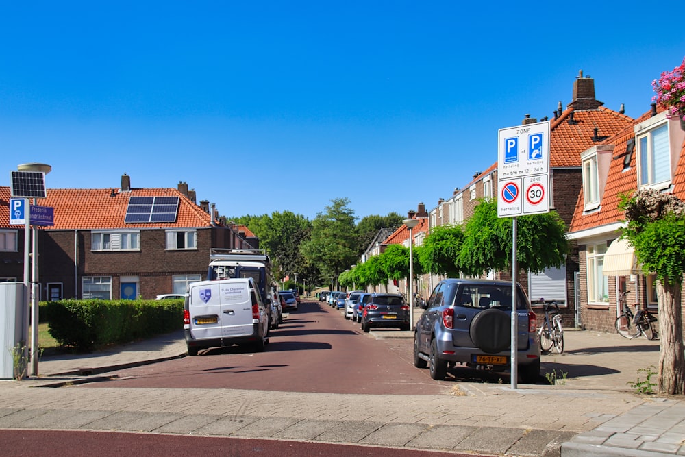 a street with cars parked on the side of it