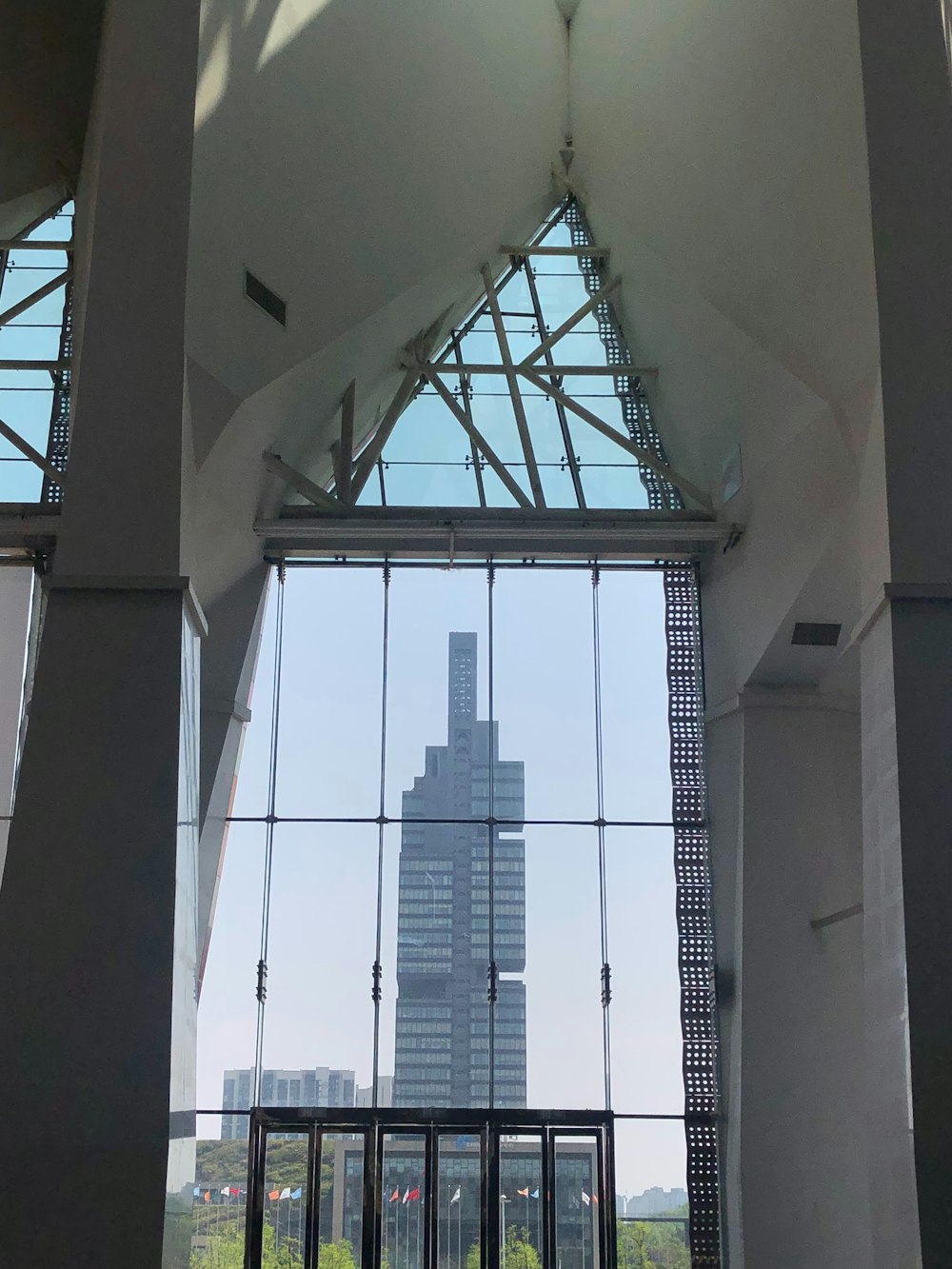 a view of a tall building through a window