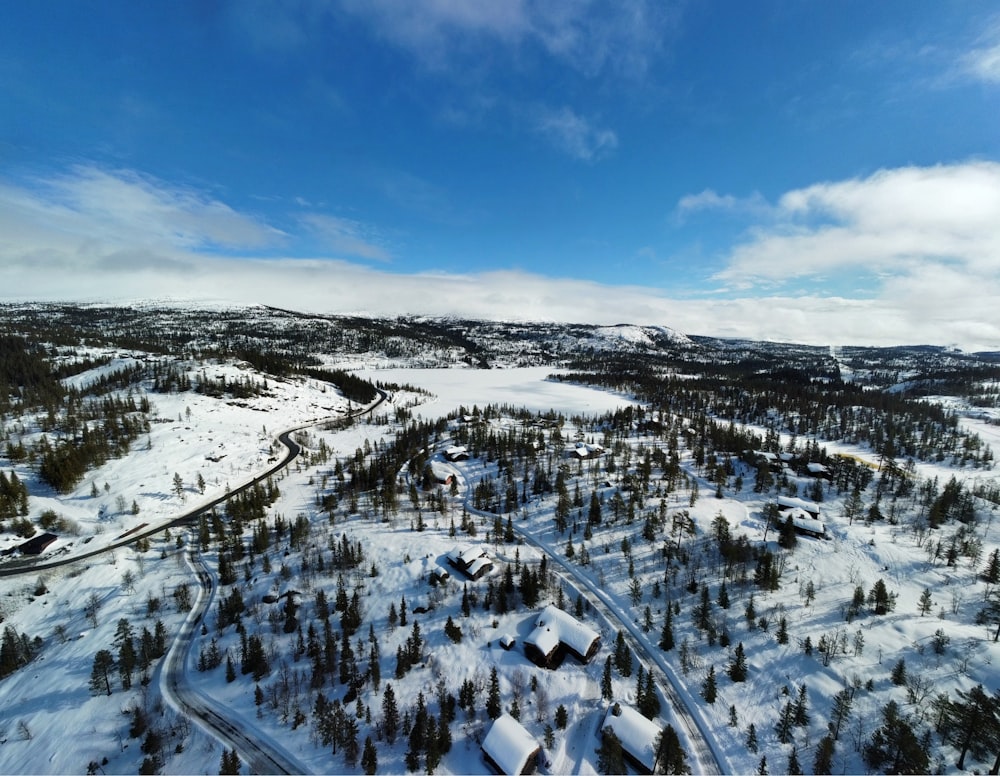 an aerial view of a snow covered area