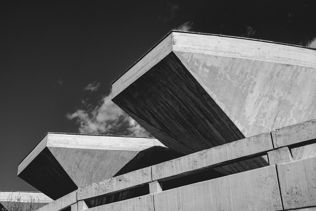 a black and white photo of a concrete structure,