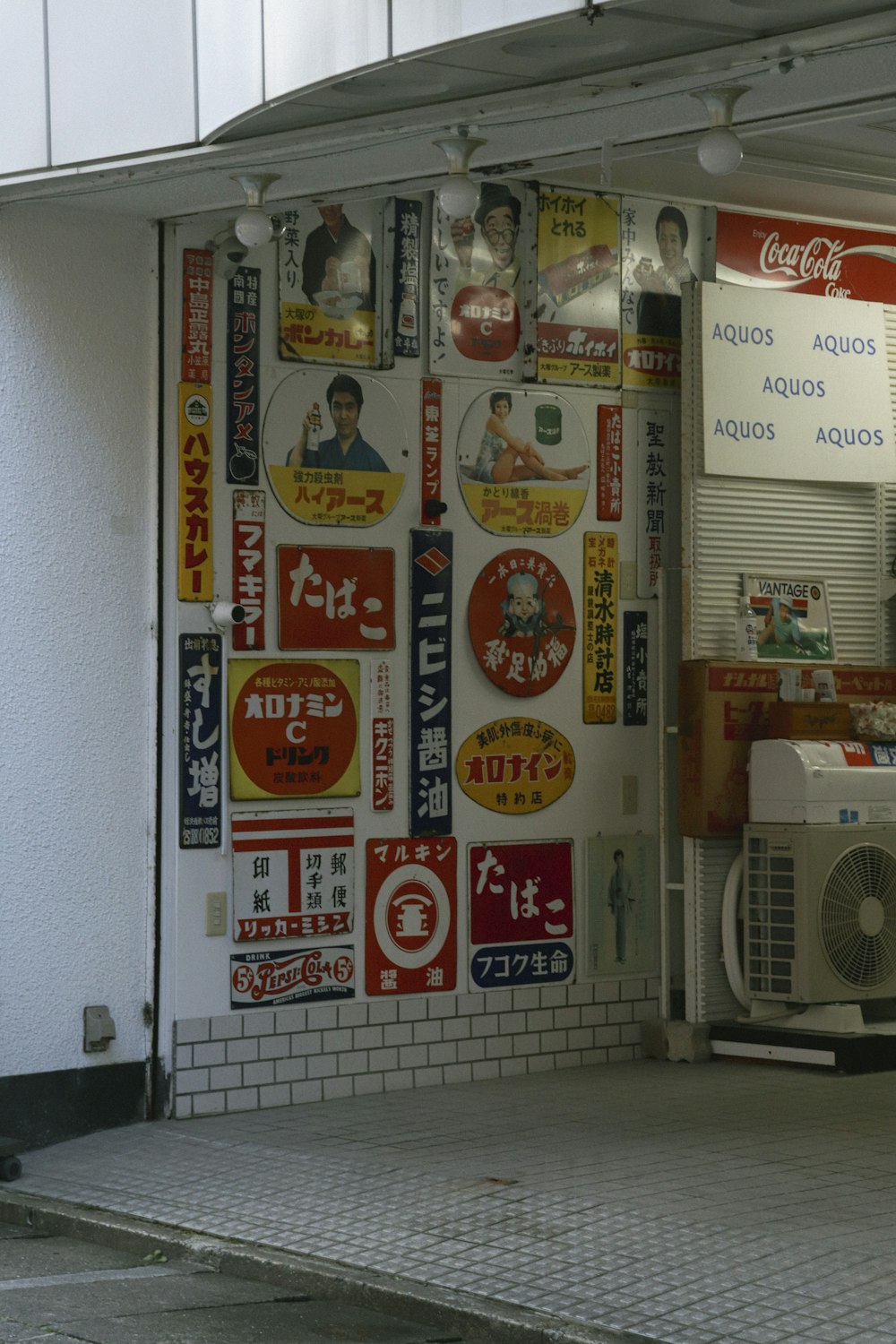 a building with a bunch of signs on the side of it