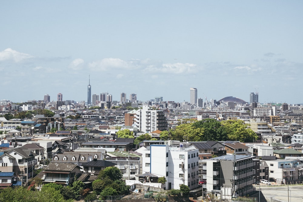 a view of a city with tall buildings