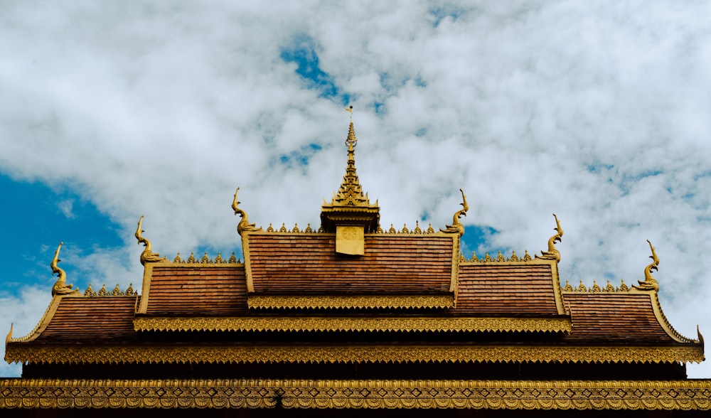 the roof of a building with a sky in the background