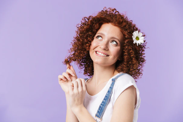 a woman with a flower in her hair
