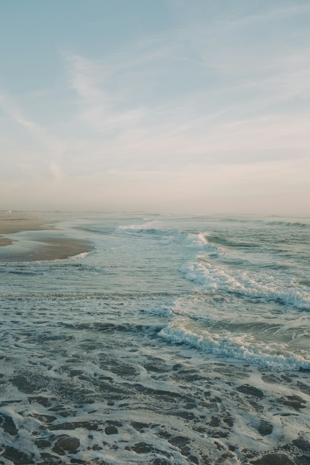 a view of the ocean from a beach