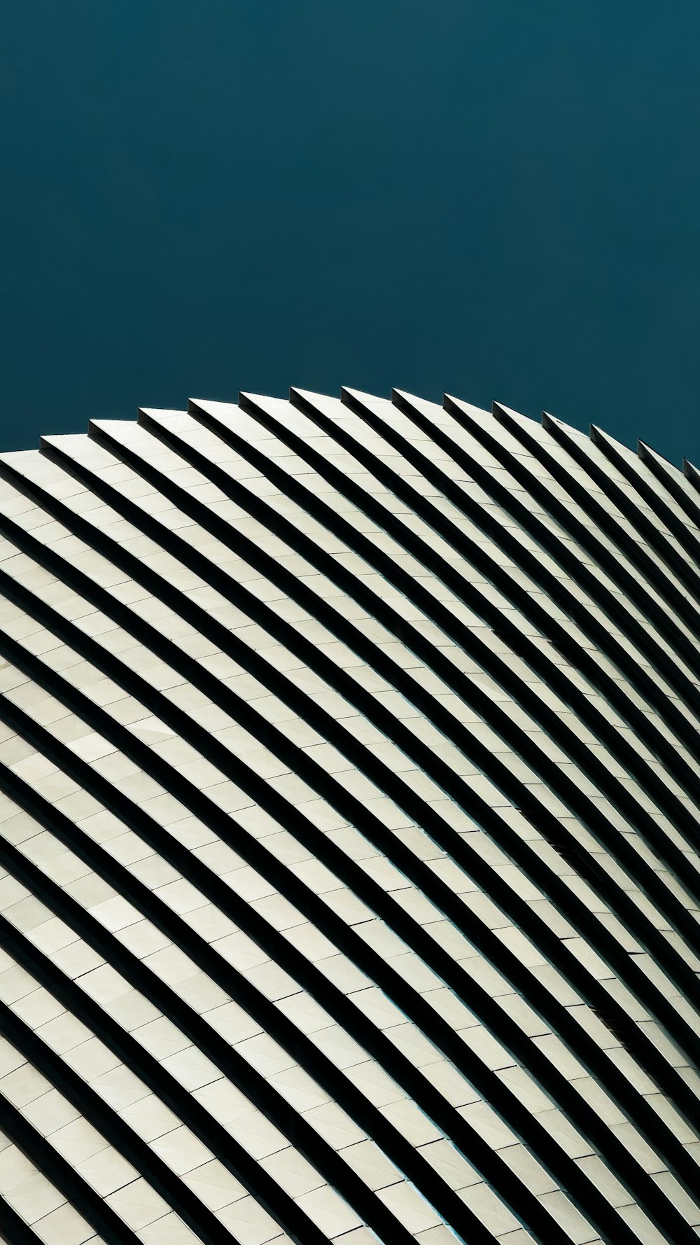 a close up of a building with a sky background