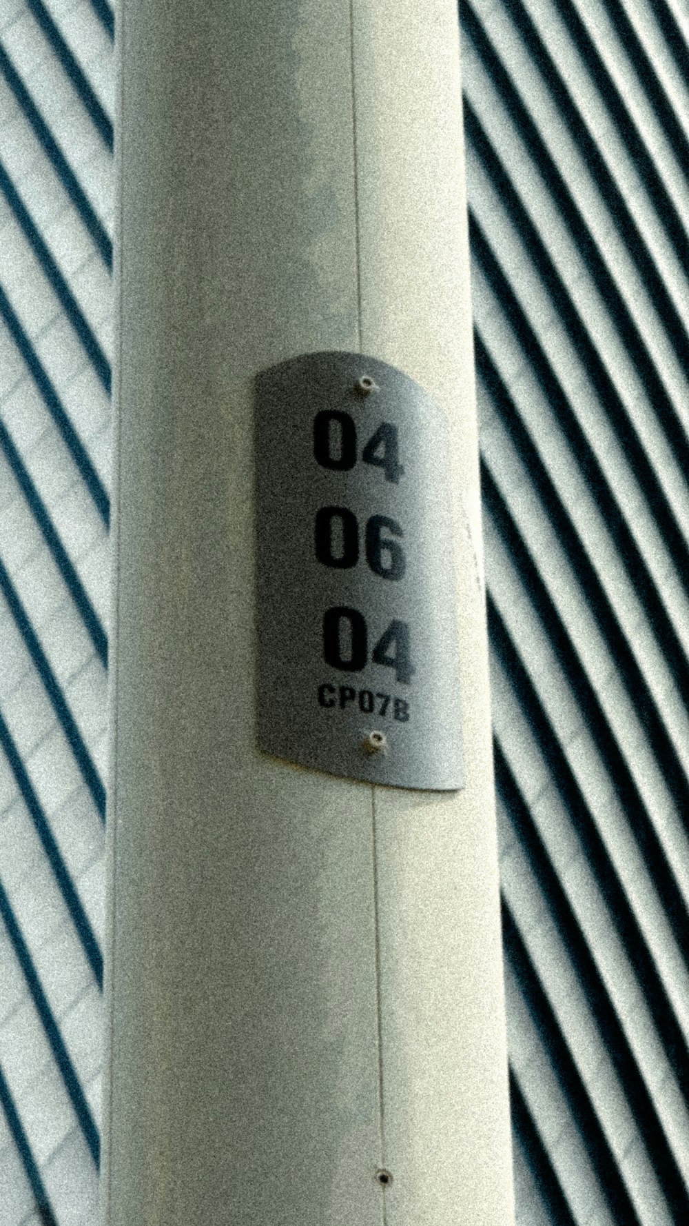 a close up of a pole with a sign on it