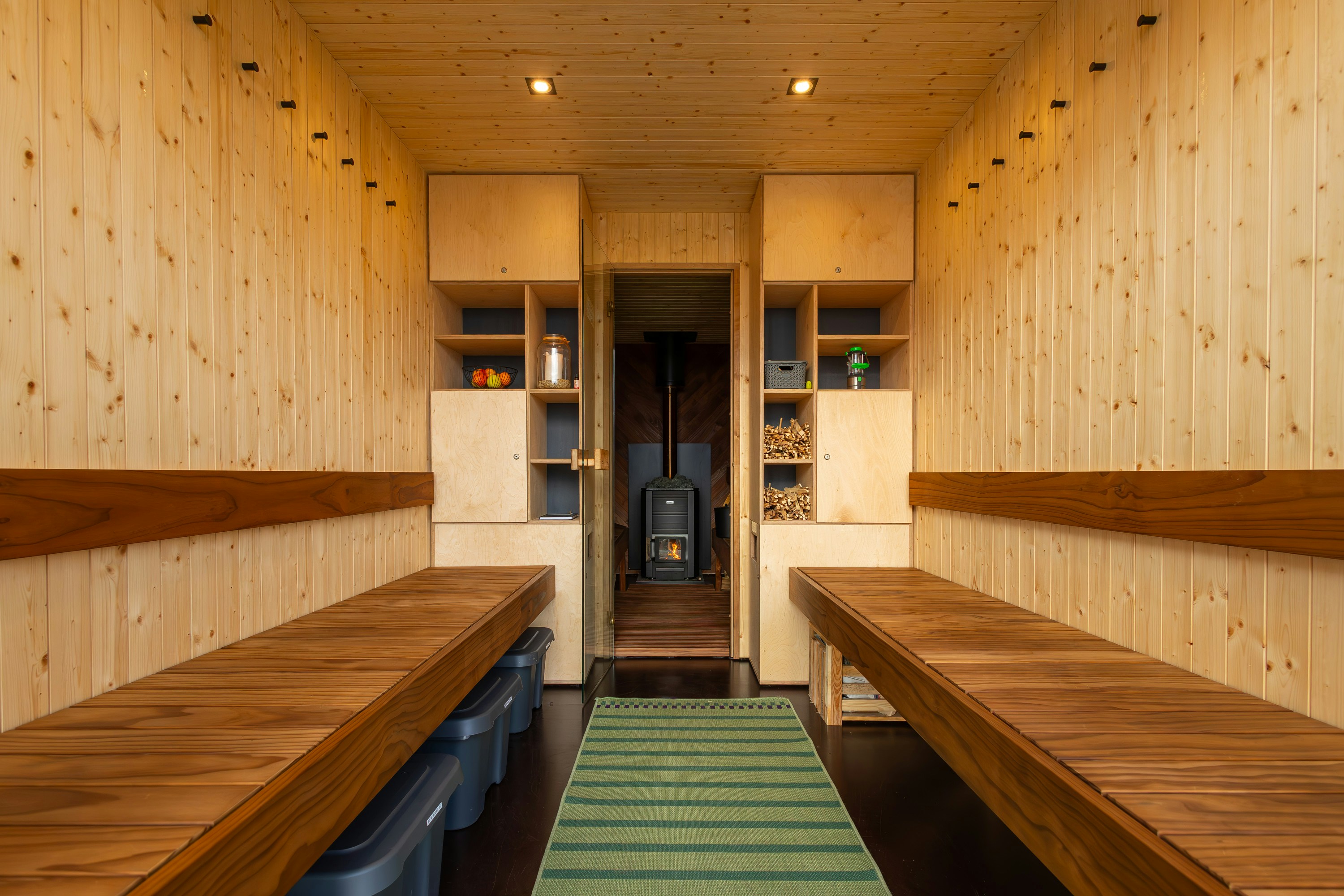 a long row of wooden benches sitting next to each other