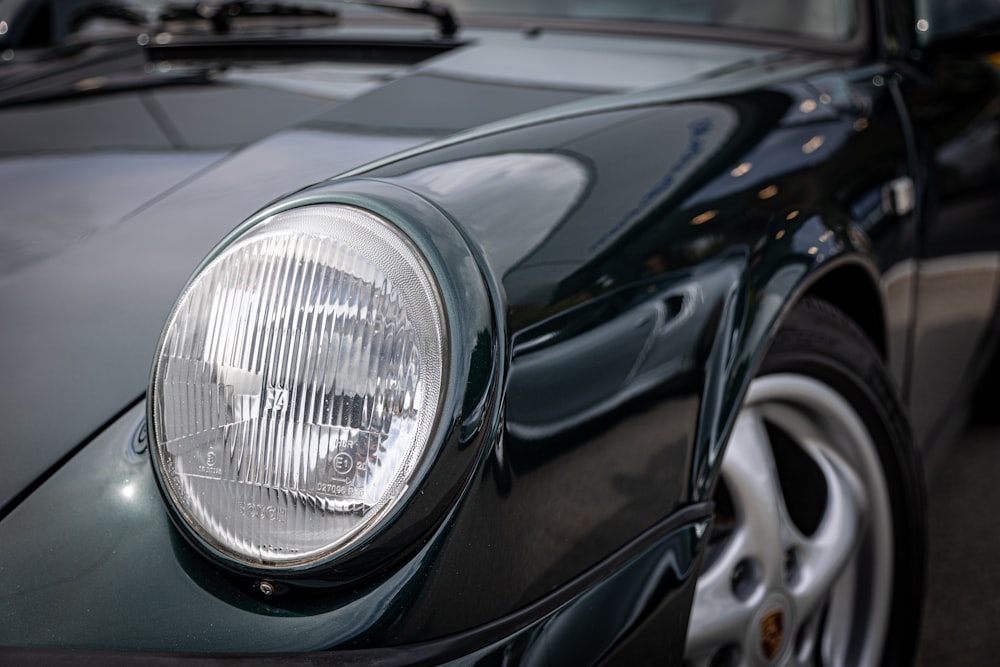 a close up of a car headlight on a car