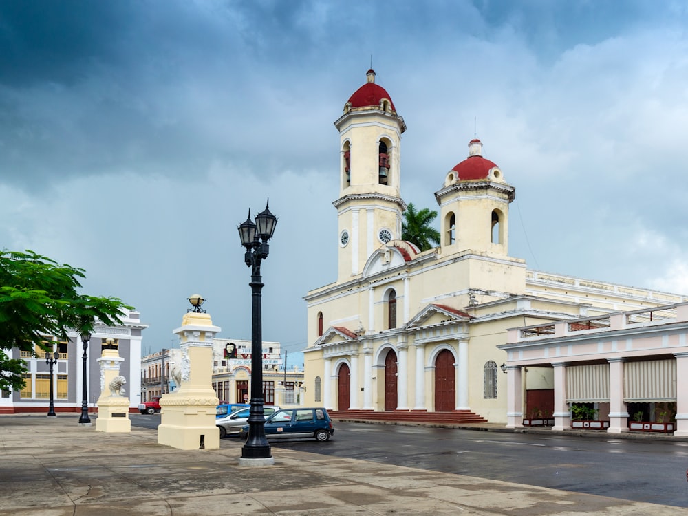 a large white building with a red roof