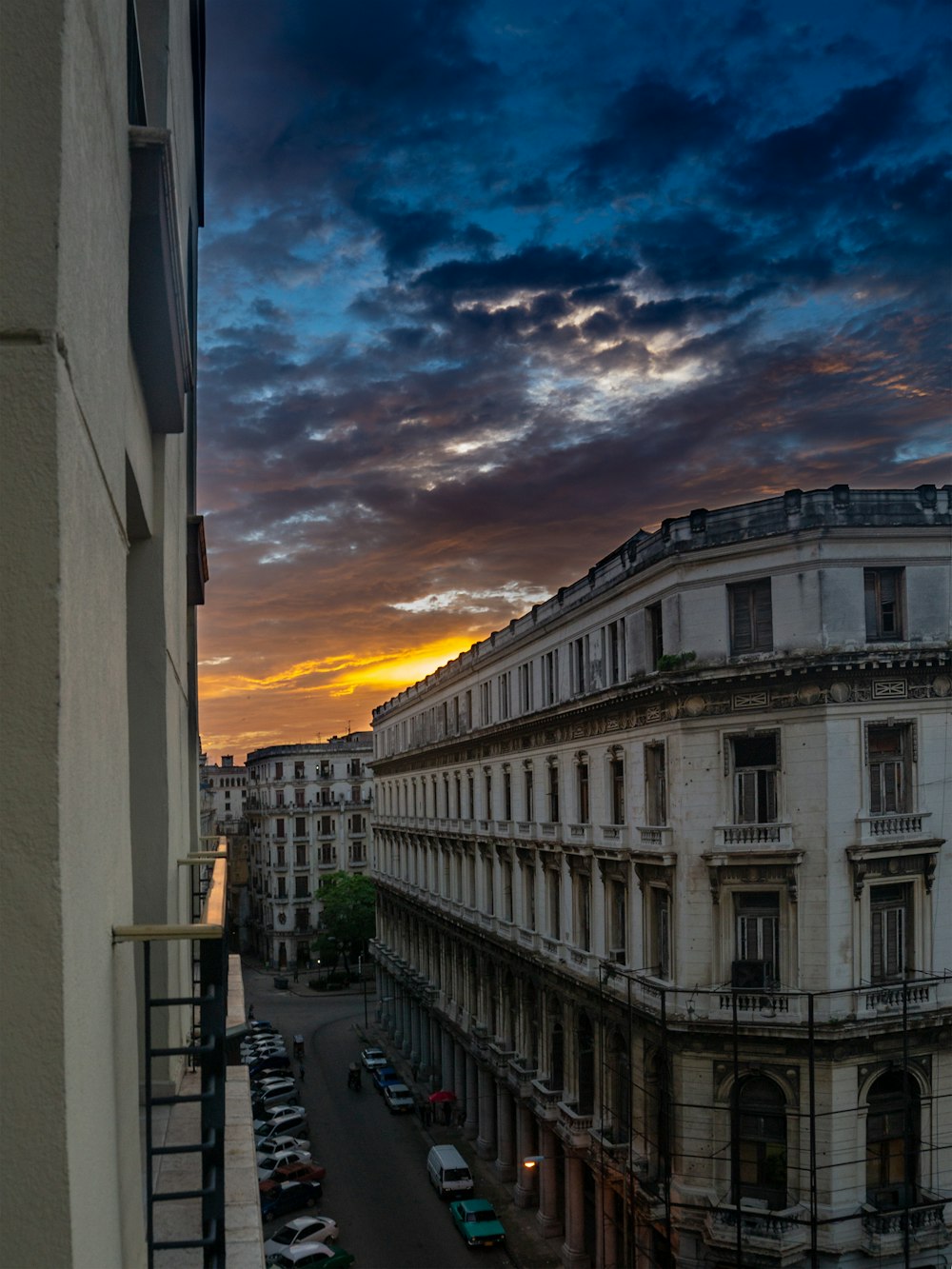 a view of a city street at sunset