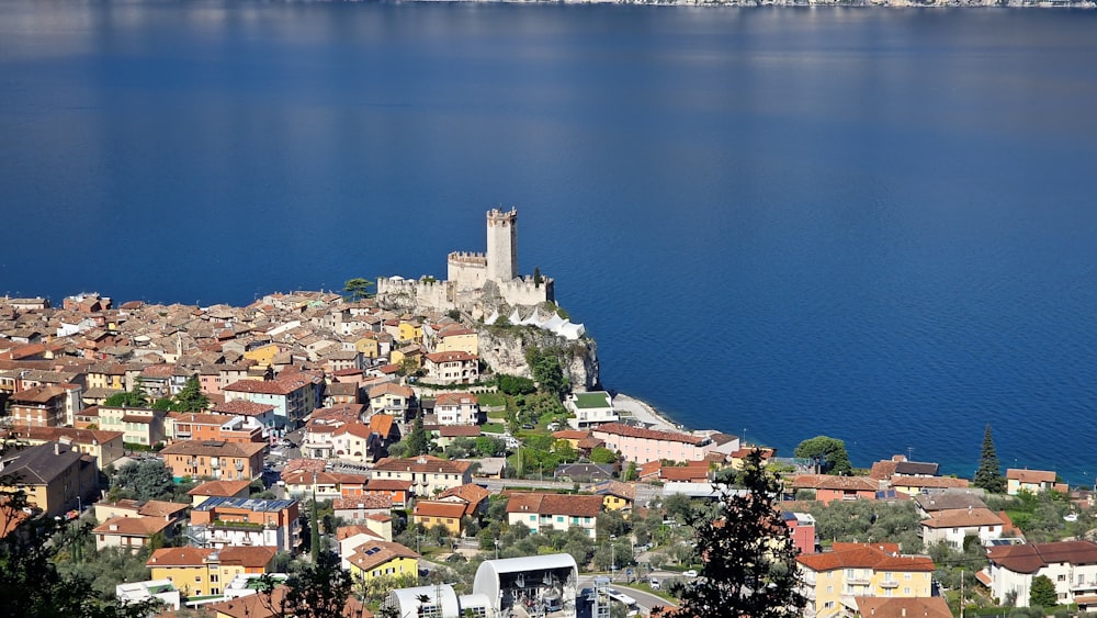 a view of a city with a lake in the background