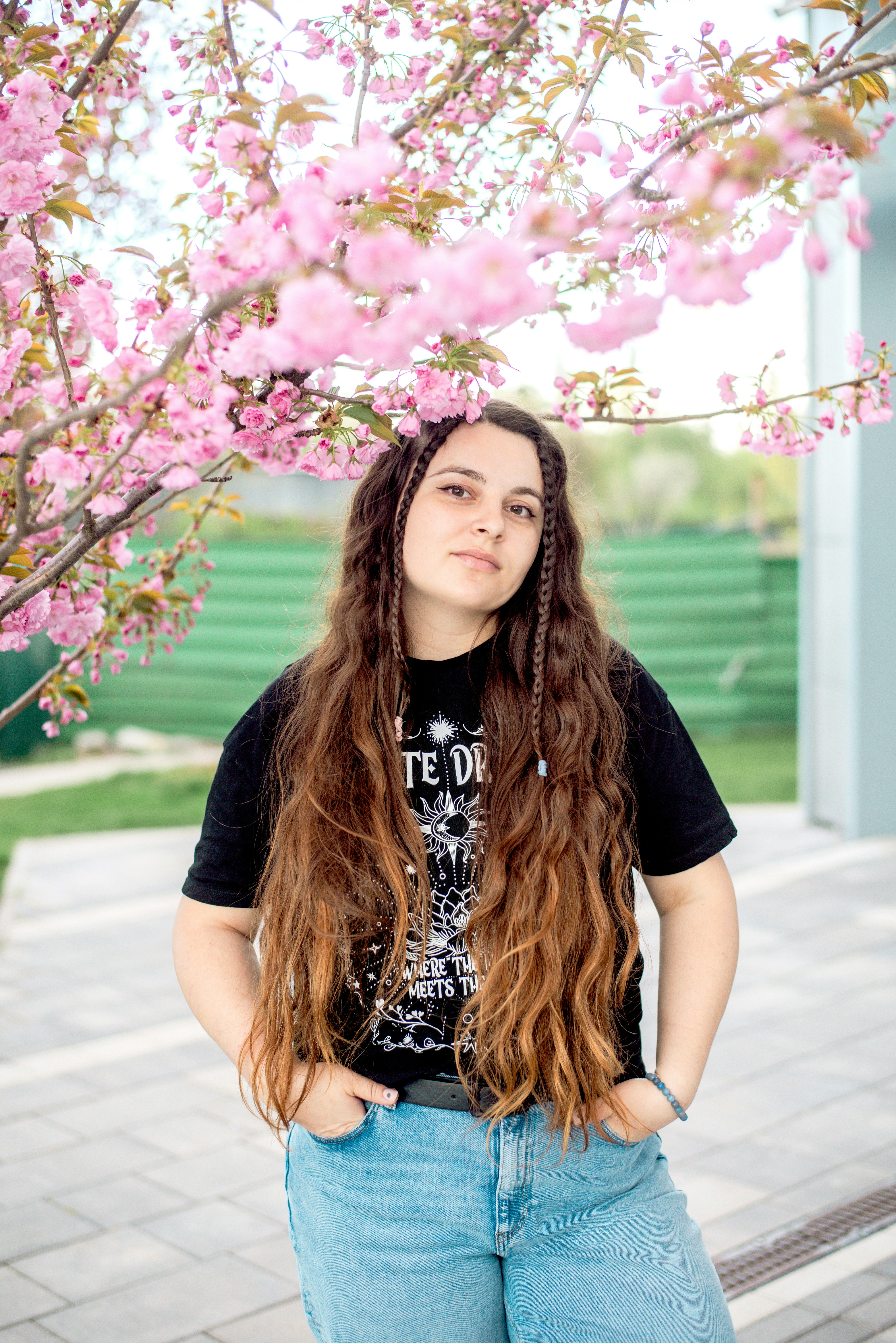 A woman with long hair standing in front of a tree photo – Free Київ ...