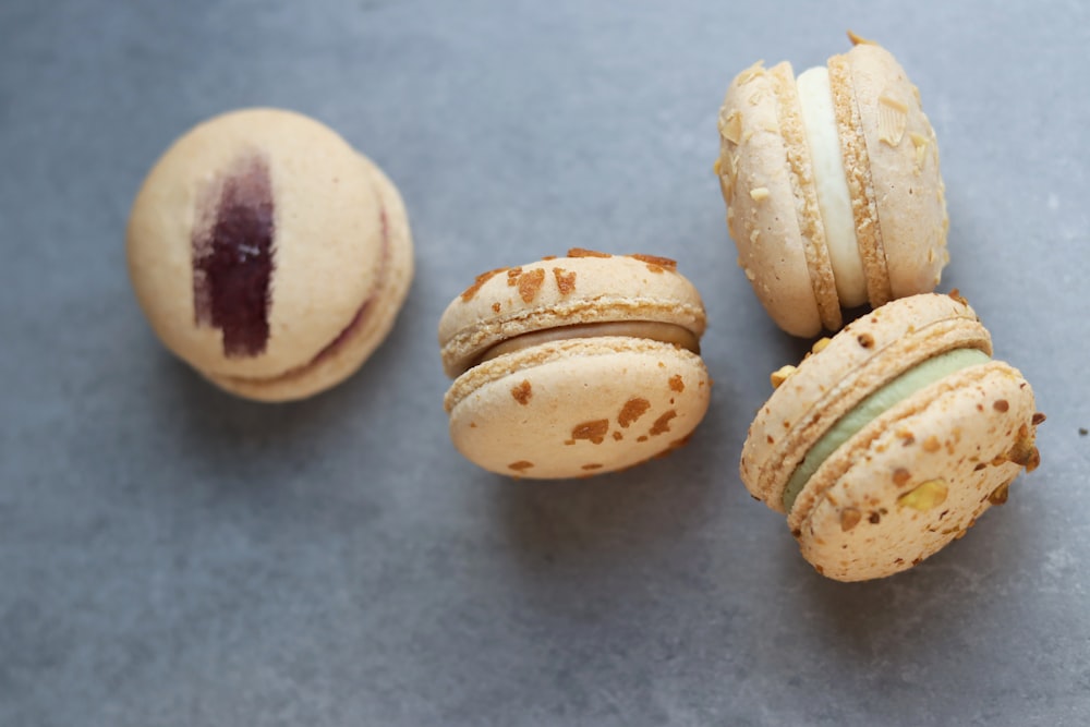 a group of three macaroons sitting on top of a table